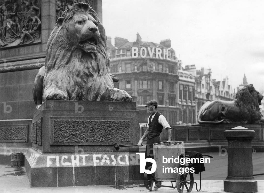 Anti-fascist slogan on Trafalgar Square, 1934 (b/w photo)