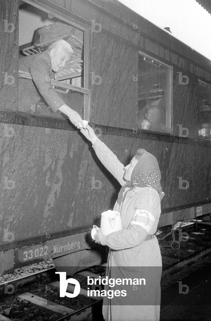 Farewell at a railway station, 1954 (b/w photo)
