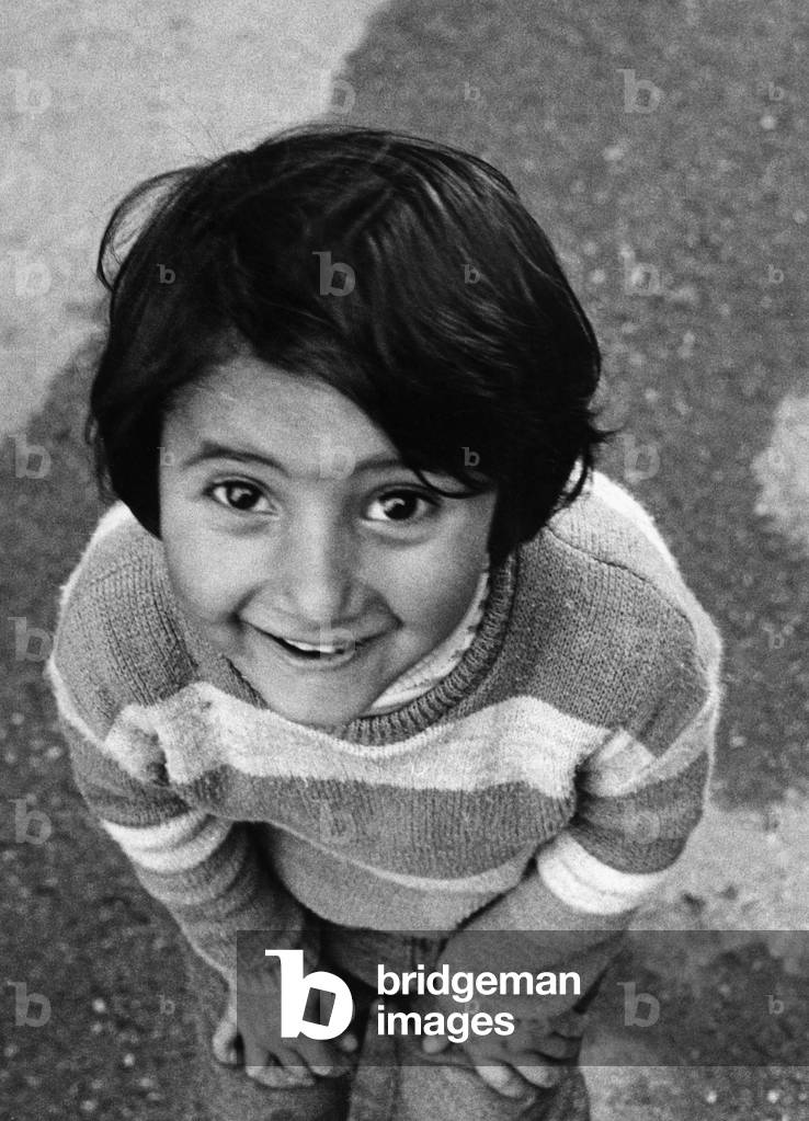 Portrait of a migrant child, Germany, 1973 (b/w photo)