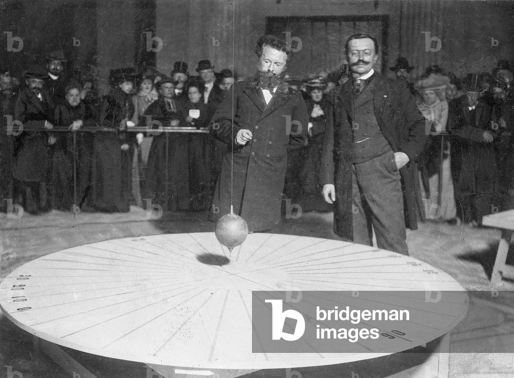 Camille Flammarin at the Foucault pendulum, 1901 (b/w photo)