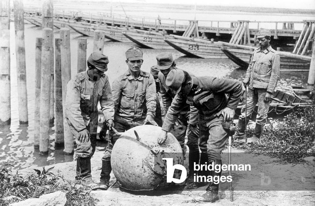 Austro-Hungarian soldiers with a sea mine, 1916 (b/w photo)