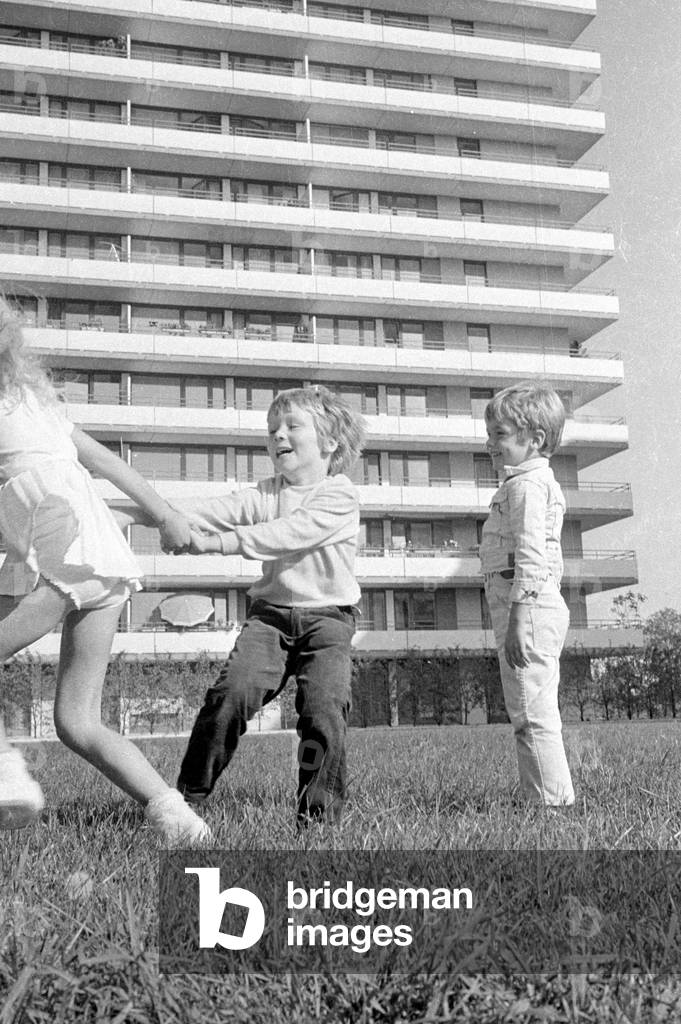 Tommi Ohrner playing with his siblings, 1969 (b/w photo)