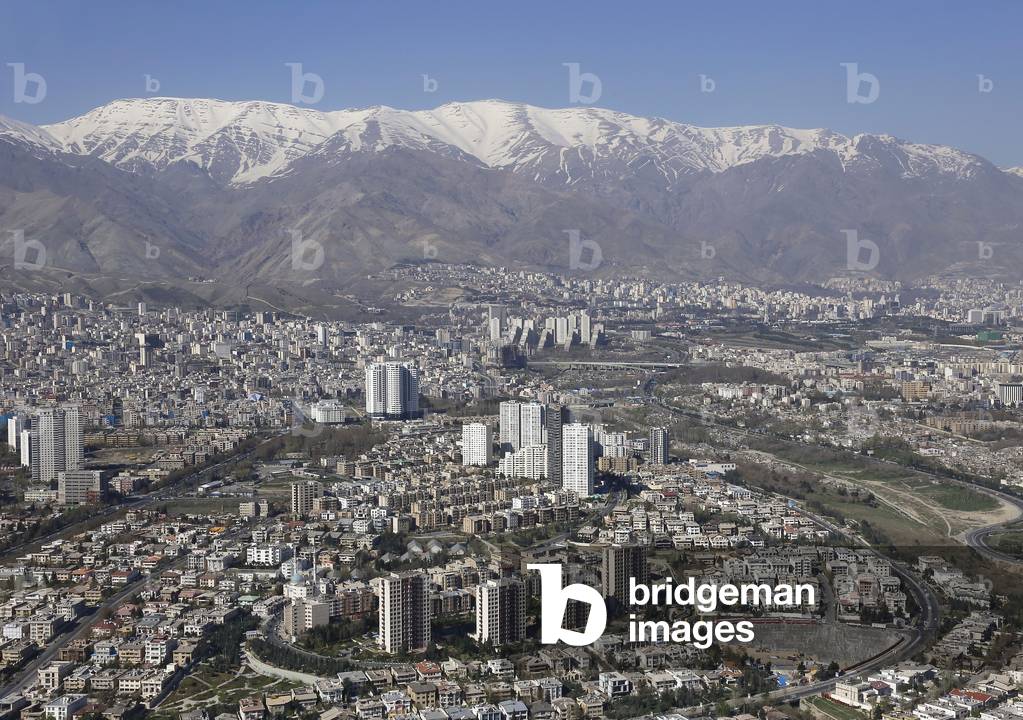 View of the megacity of Tehran with snowy mountains in the background, 25th March 2013 (photo)