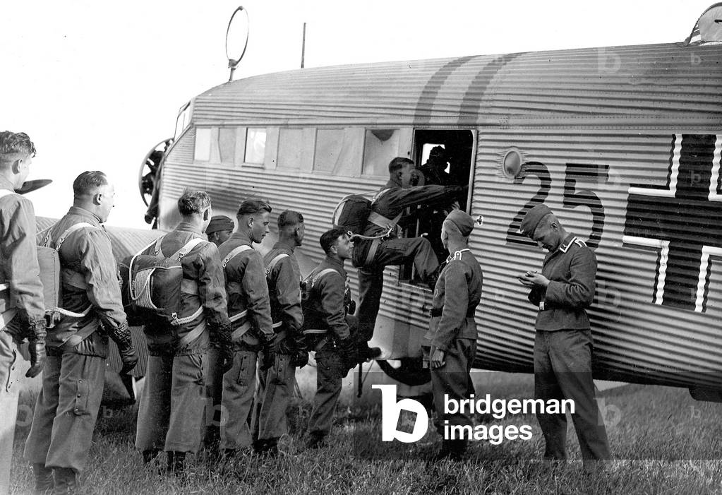 Paratroopers in front of a Junkers Ju 52, 1938 (b/w photo)