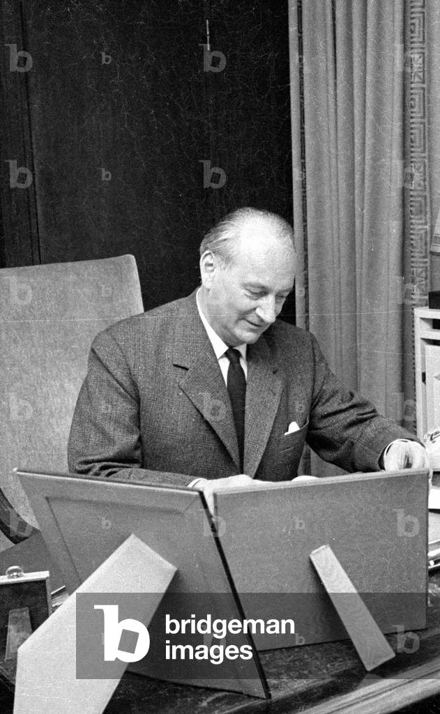 Prince Louis Ferdinand of Prussia at his desk, 1970 (b/w photo)