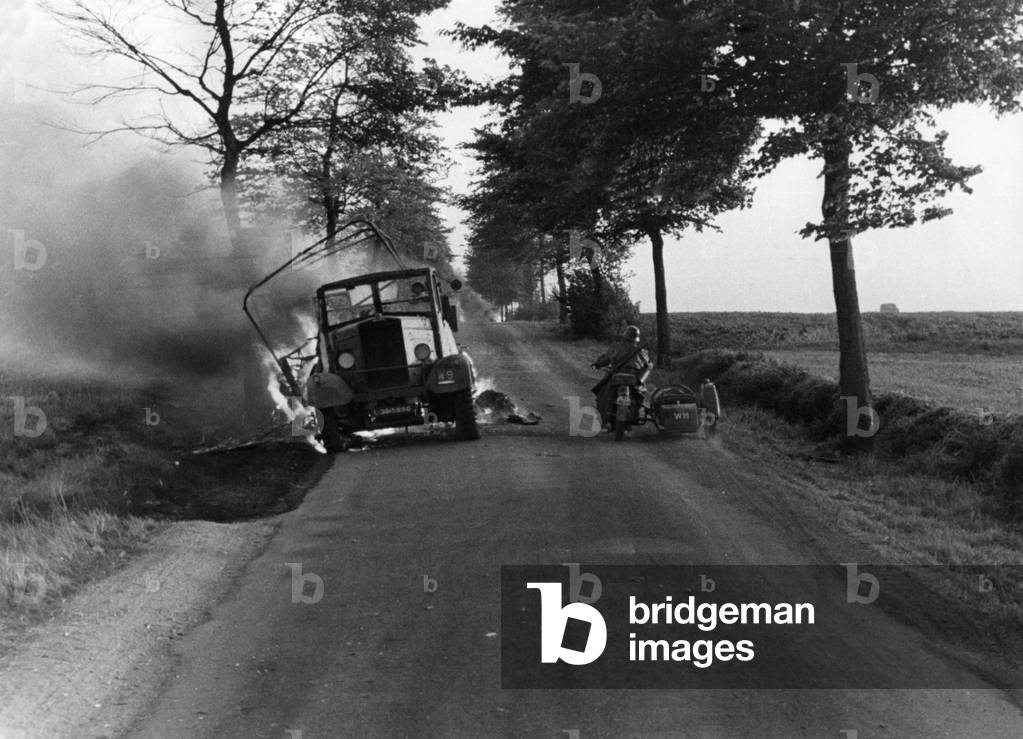 German dispatch rider on a route of advance in France, 1940