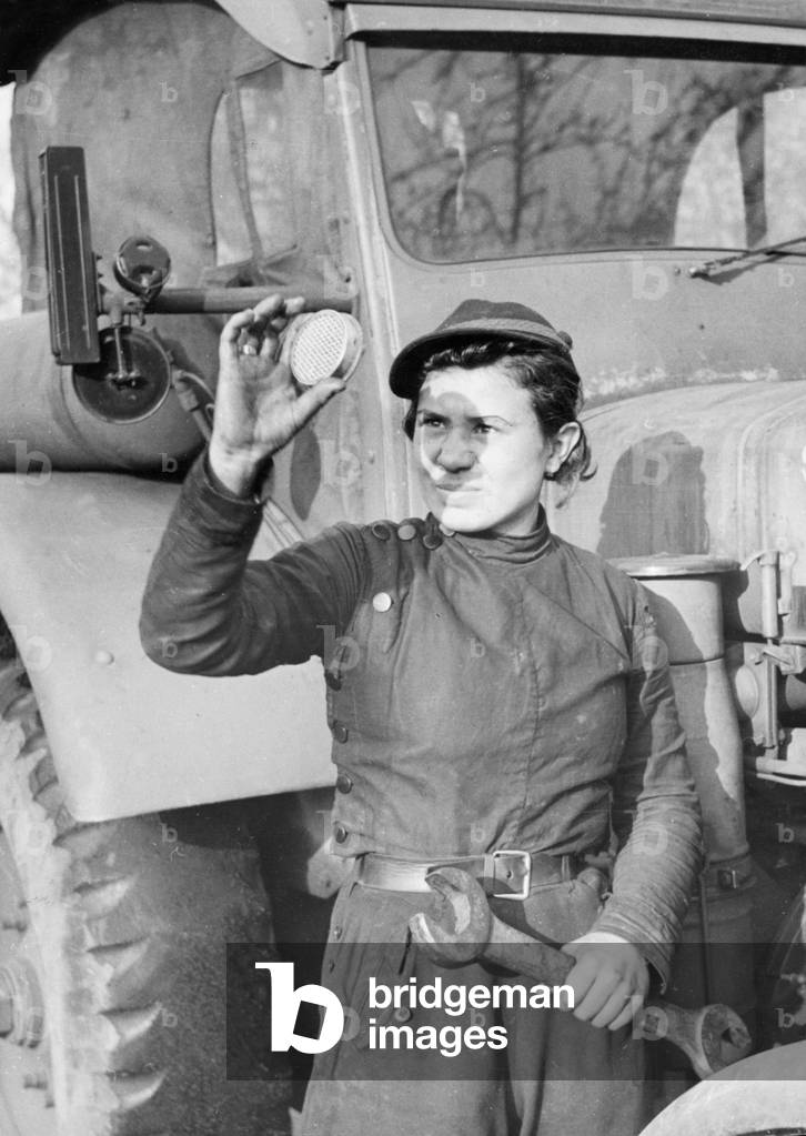 Reportage about a female tractor driver, 1939 (b/w photo)