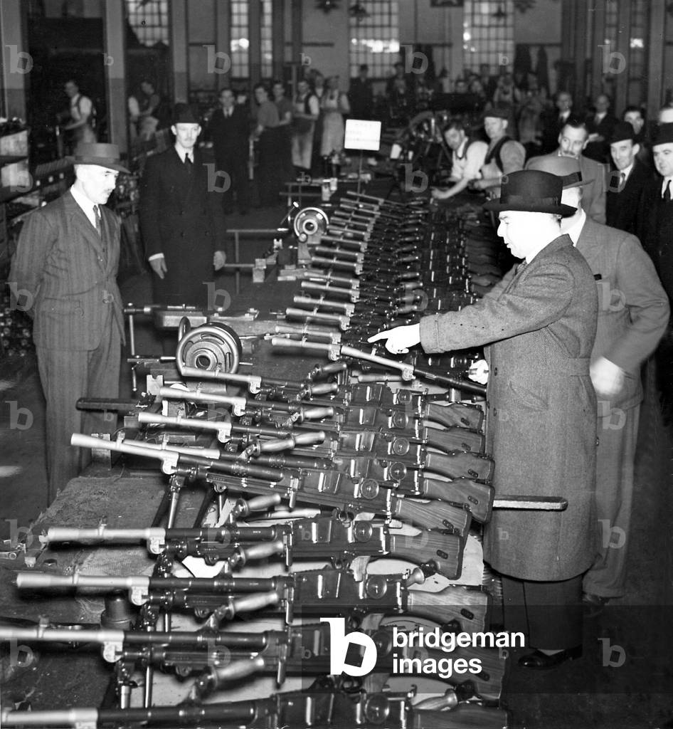 Leslie Hore-Belisha visits a British firearms factory, 1939 (b/w photo)