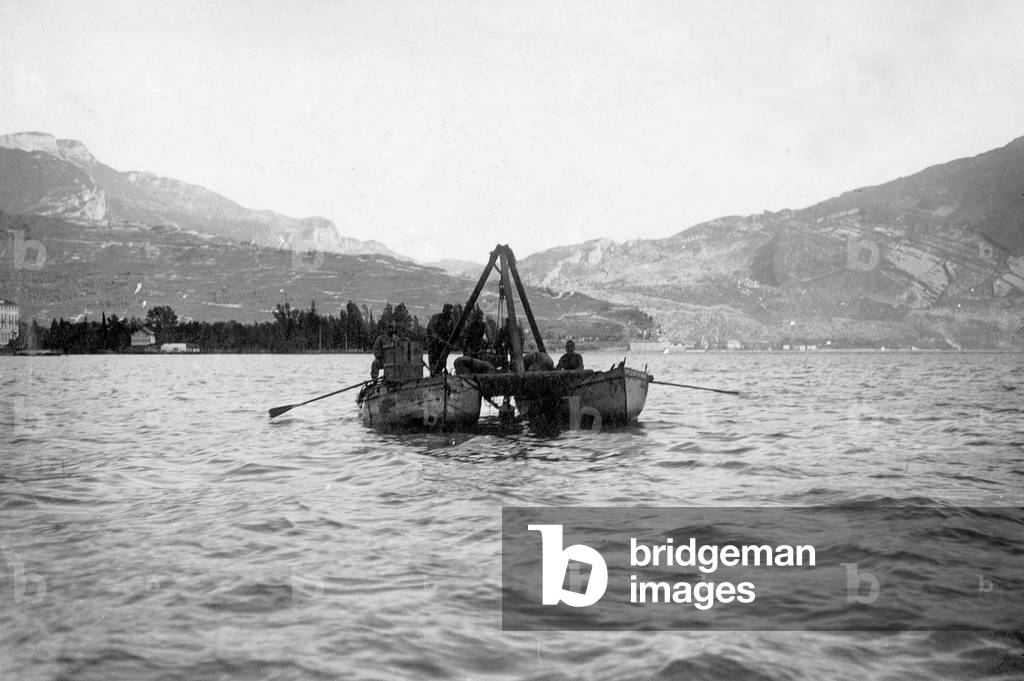 Laying mines on the Lake Garda, 1915 (b/w photo)