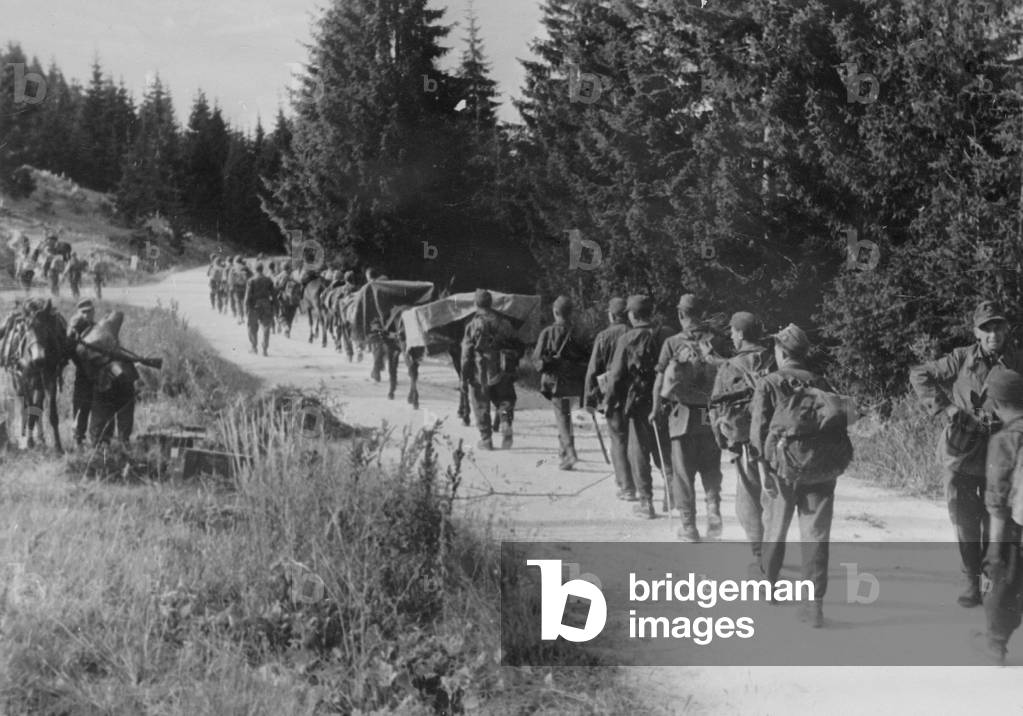 Soldiers of the Waffen-SS while combating the partisans, 1944 (b/w photo)