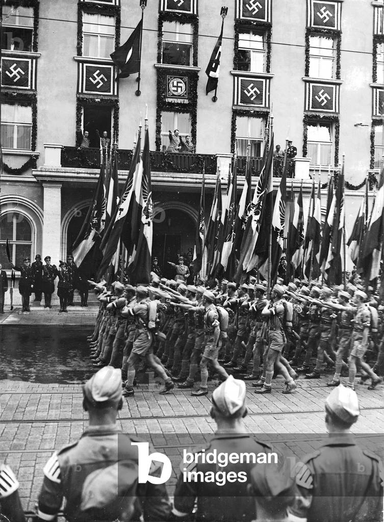 Hitler Youth flaunts in front of Adolf Hitler in the hotel 'Deutscher Hof', 1936 (b/w photo)