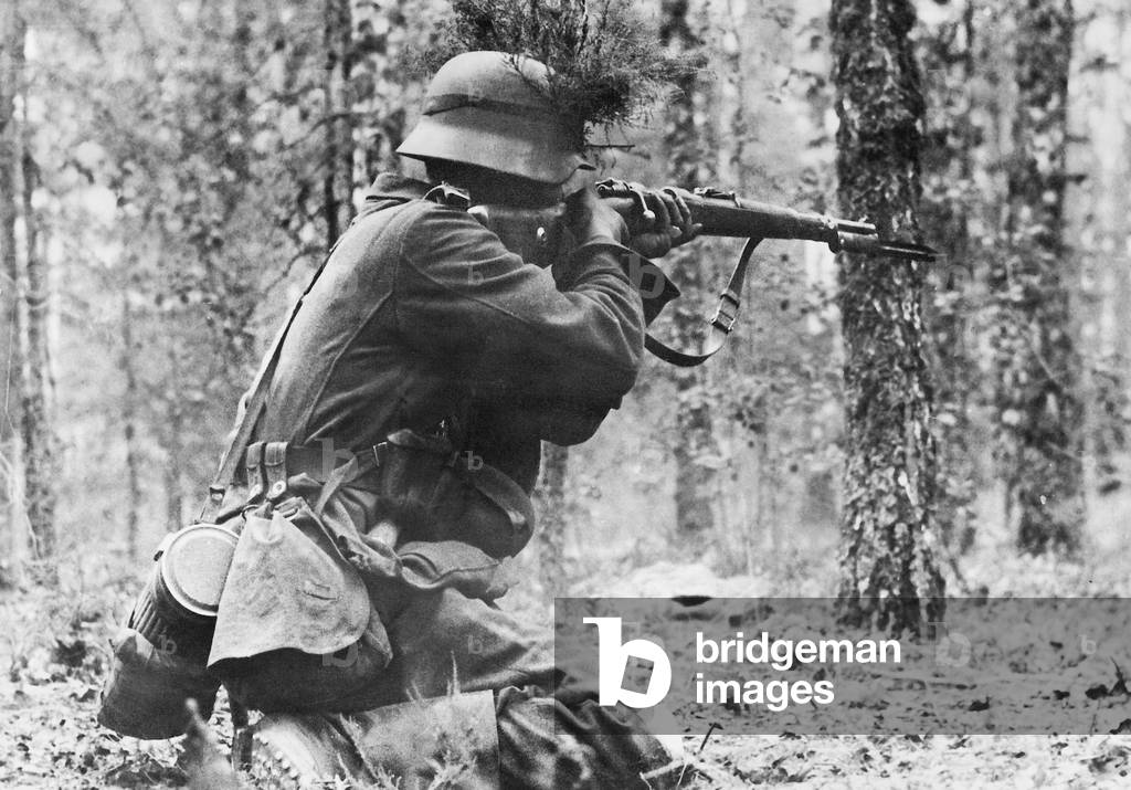 German Soldier in Combat at the Eastern Front, 1941 (b/w photo)