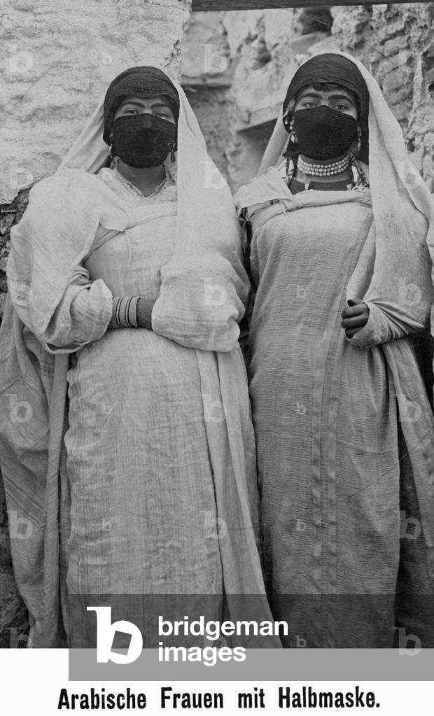Arab women wearing half masks in Tunisia, 1930s (b/w photo)