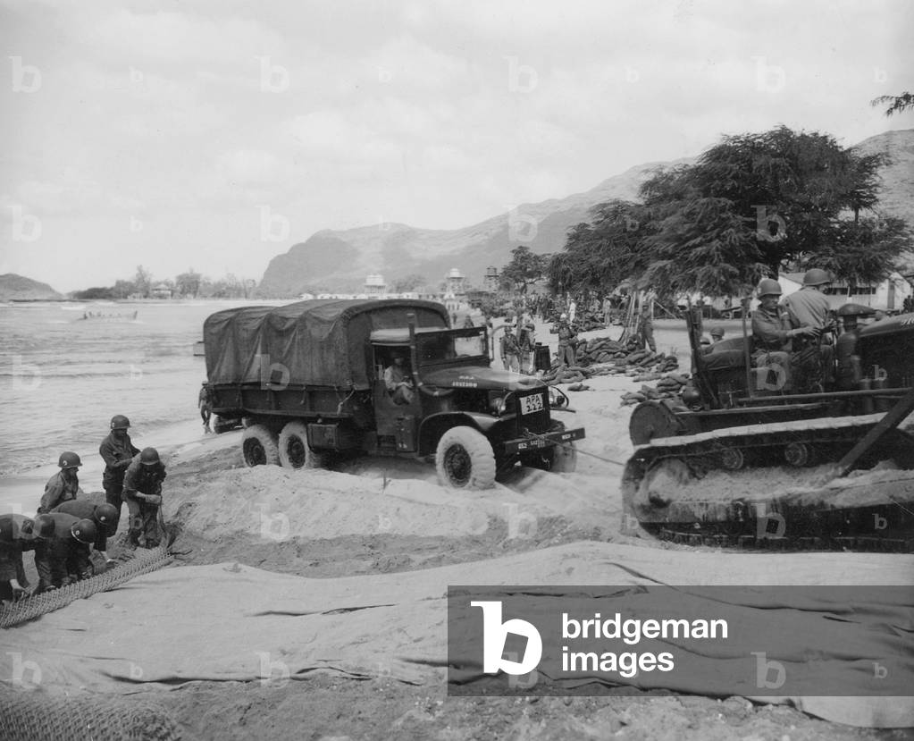 American Troupes Landing on an Island in the Pacific, 1941 (b/w photo)
