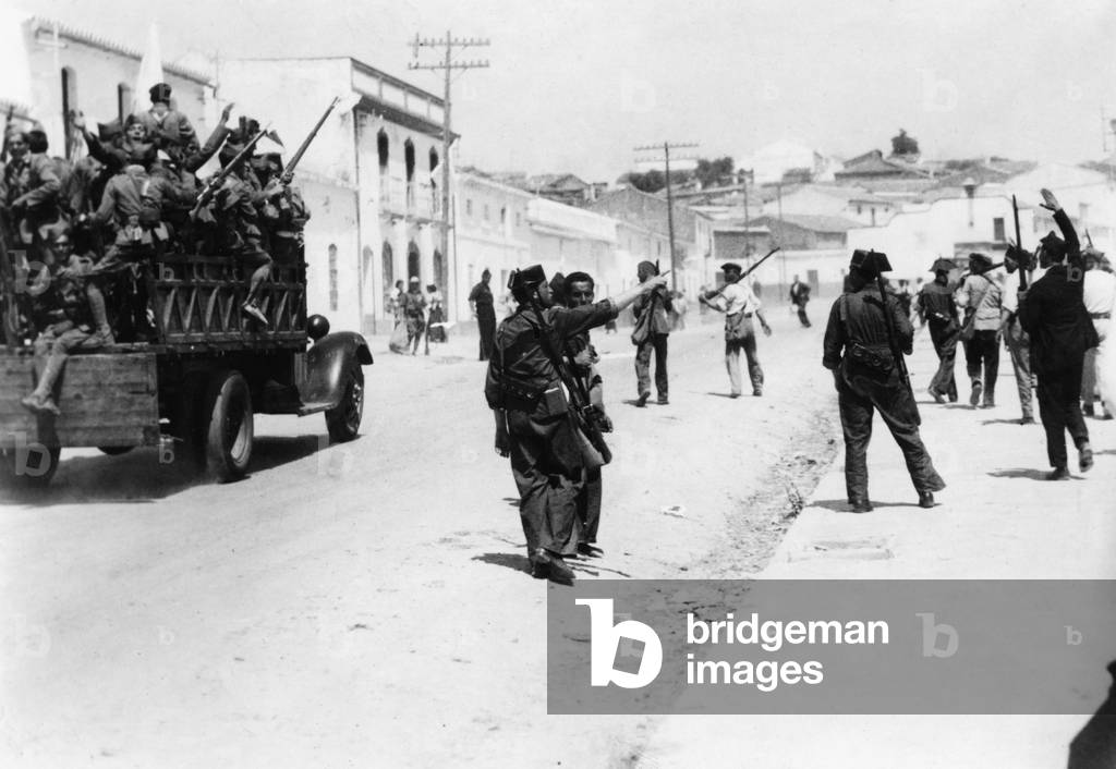 Spanish national troops on the march at Seville, 1936