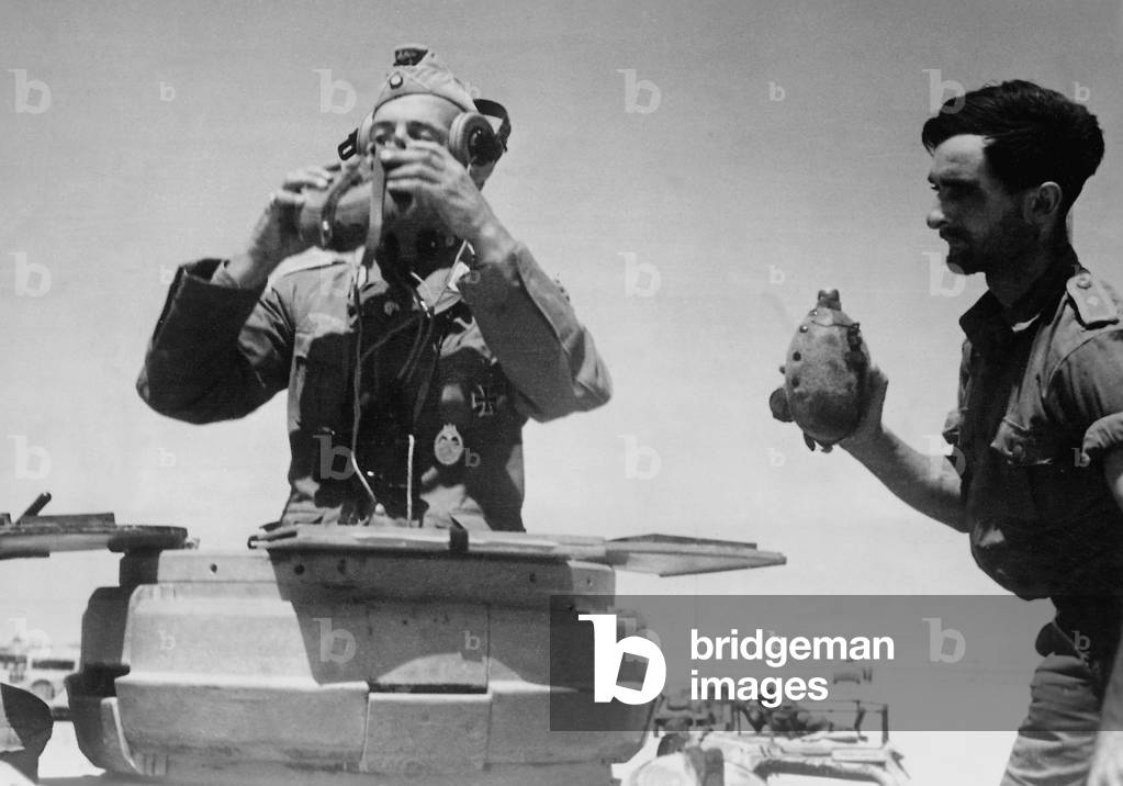 German Soldiers Drink from their Water Bottles, 1941 (b/w photo)