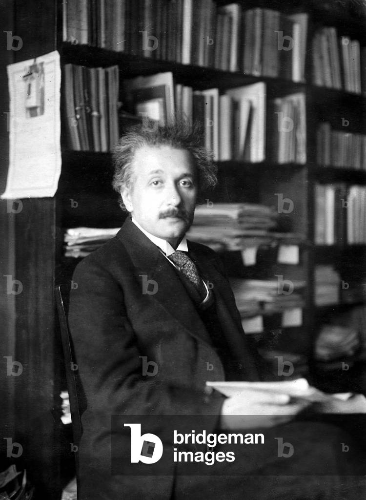Albert Einstein in his library, Berlin, 1920 (b/w photo)