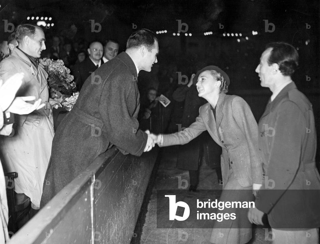 Rudolf Hess congratulated Maxi Herber and Ernst Baier in the Berlin Sport Palace, 1938 (b/w photo)