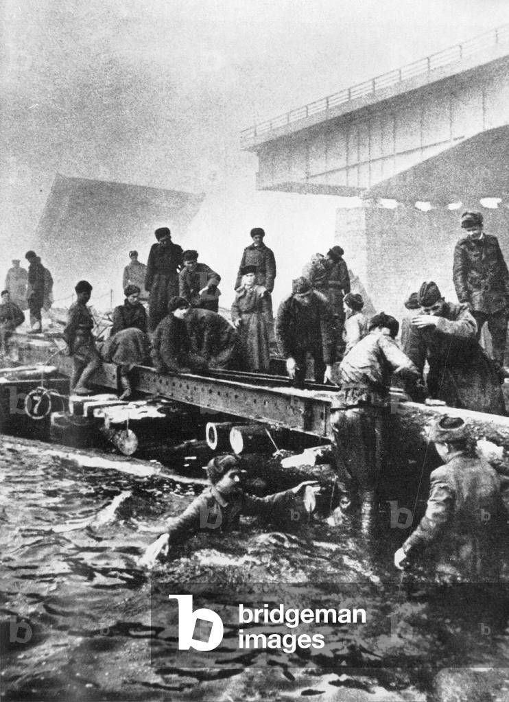 Pioneers of the Red Army building a bridge over the Oder during World War II, 1945 (b/w photo)