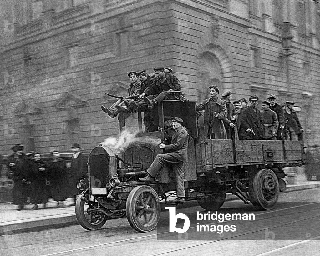 Truck with members of the People's Marine Division in Berlin, 1918 (b/w photo)
