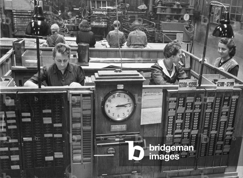 Female workers in a factory, 1943 (b/w photo)