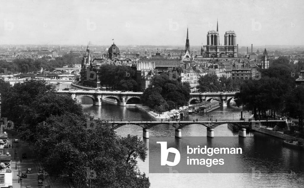 View of Cite island in Paris with in the background Notre Dame cathedral, c.1900