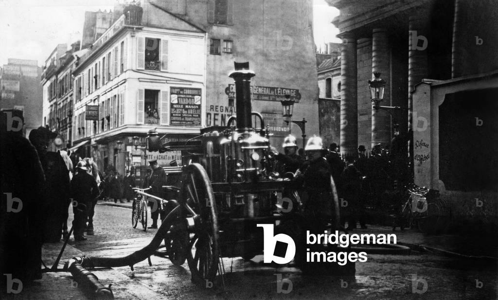 Outside Saint Pierre du Gros Caillou church in Paris, firemen flooding the demonstrators protesting against the separation between the Church and the State, 1905