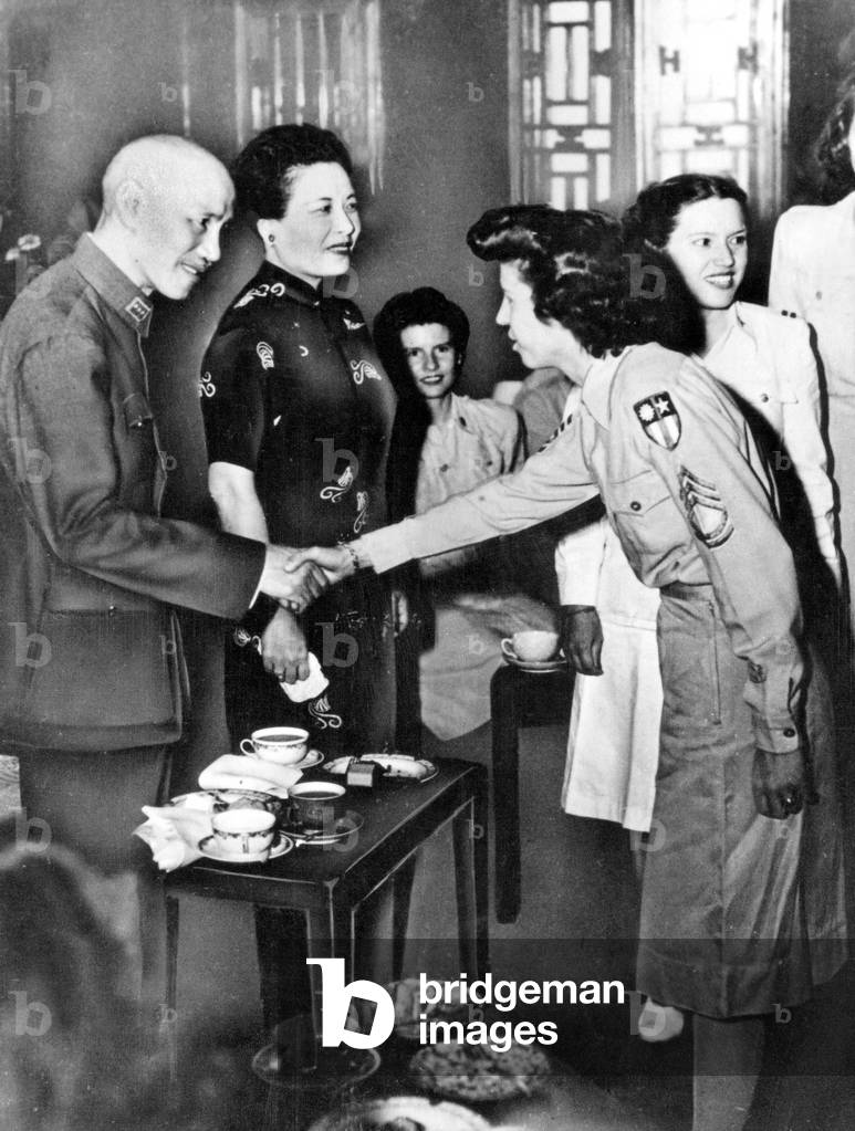 Tchang Kai Chek or Jiang Jieshi (1887-1975) chinese statesman allied of Great Britain and United States against Japan here with his wife in their home receive the visit of american guest november 14, 1945