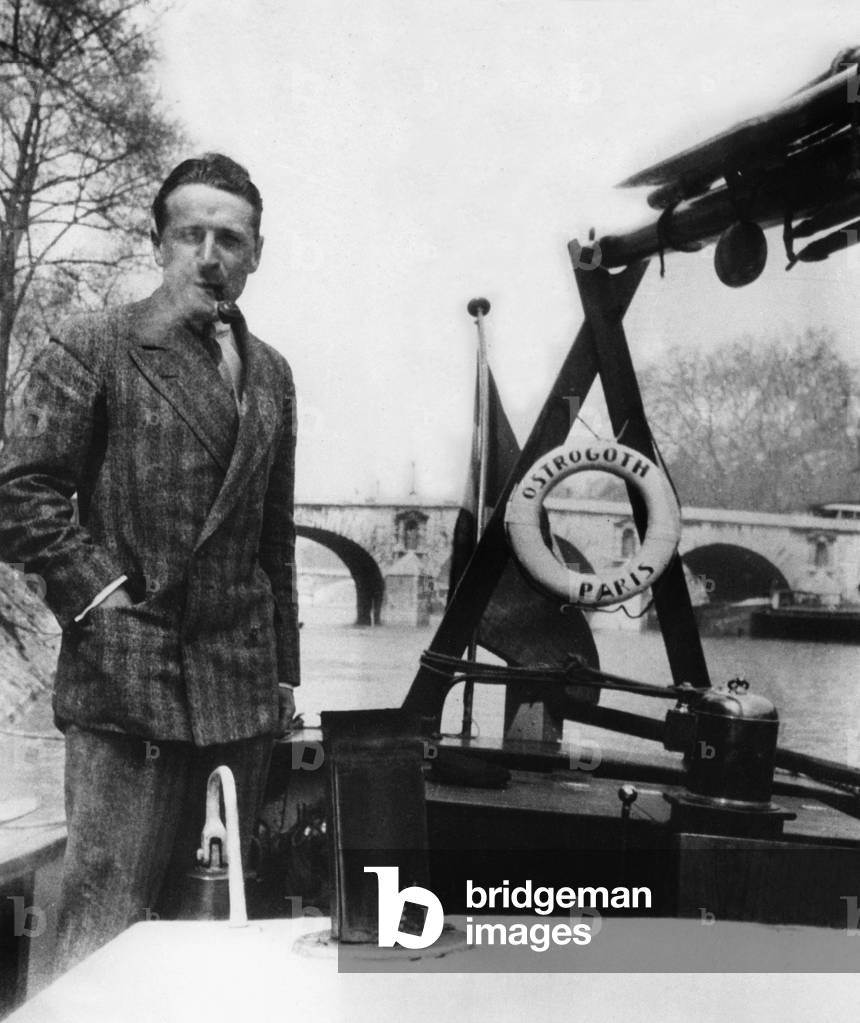 novelist Georges Simenon on boat L' Ostrogoth in 1937 here mooring in Paris , aboard that boat he sailed to and fro across parisian river network and in northern countries, he also wrote the first Maigret - fumer la pipe smoking smoke