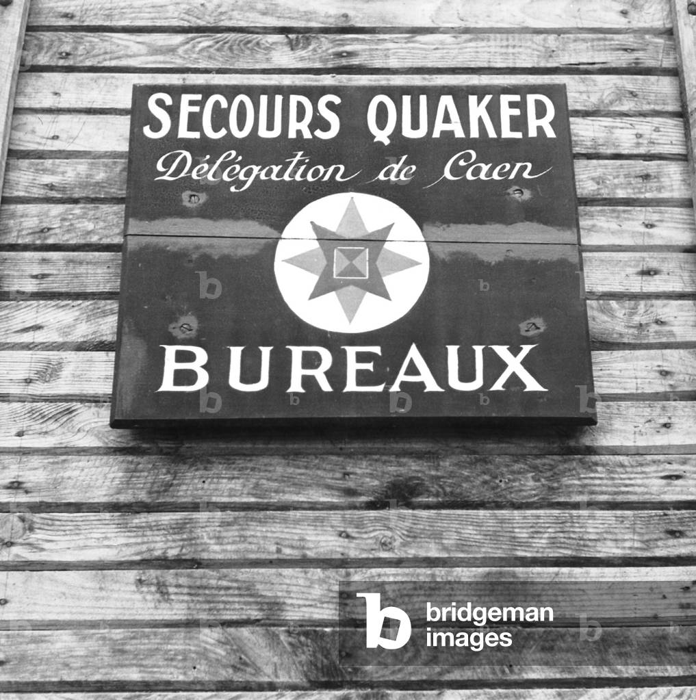 brass plate of the Quaker aid office in Caen Normandy, France, october 1944