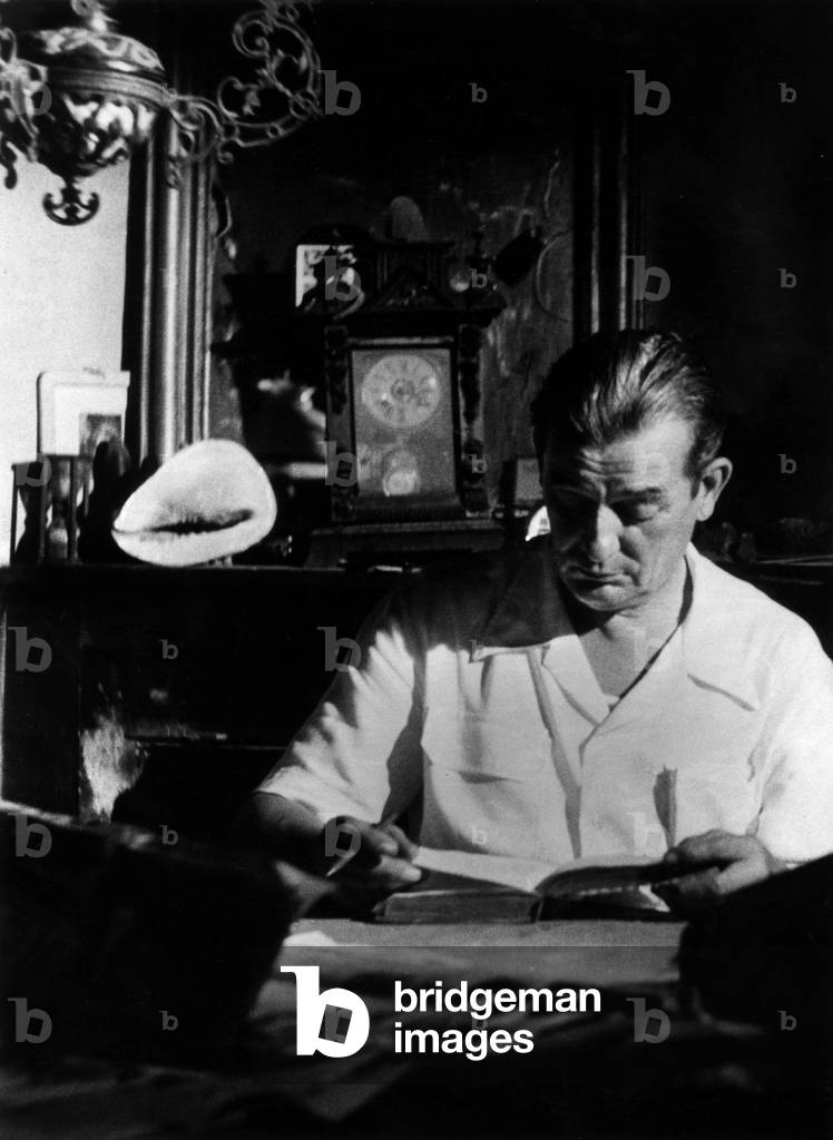 Marcel Pagnol writing dialogue for Manon des sources, 1953 (photo)