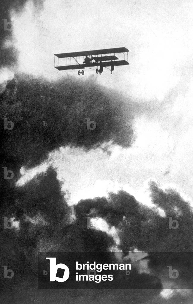 A farman biplane flying c. 1916