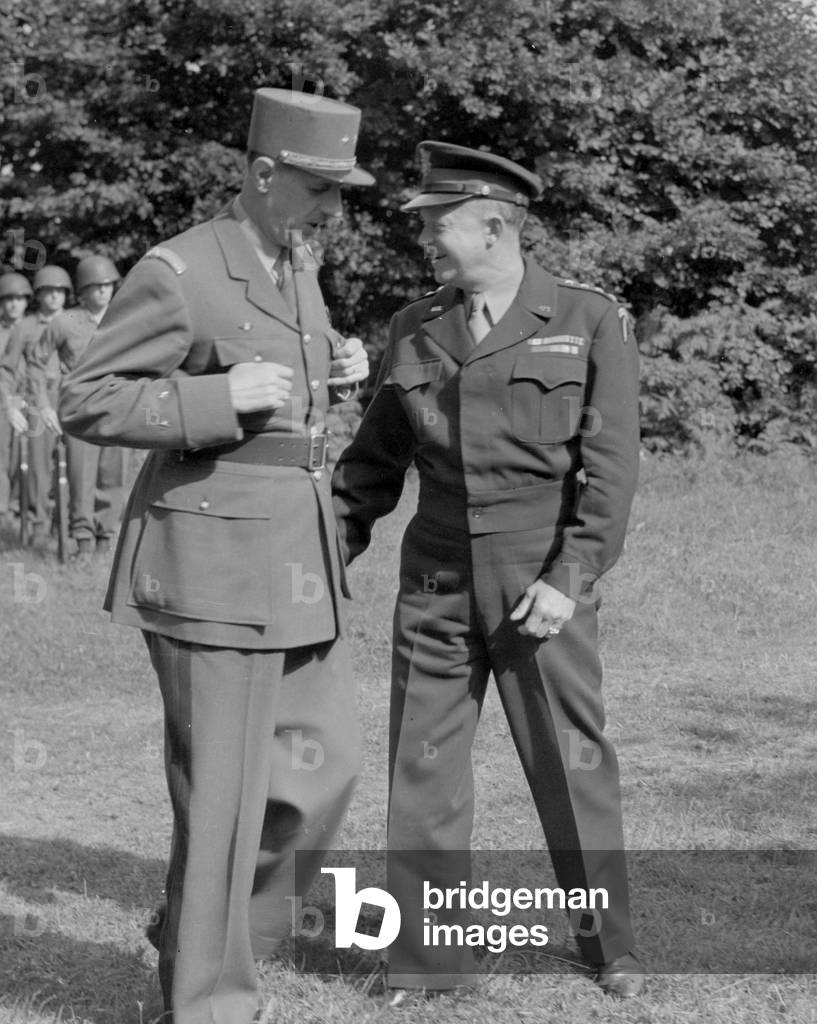 generals De Gaulle and Eisenhower reViewing american troops at the Allied headquarters august 22, 1944