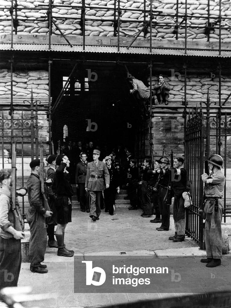 General Charles de Gaulle leaving Chartres cathedral on august 24, 1944 during inspection tour of liberated towns in France, photo NARA