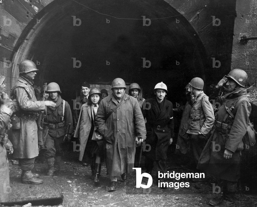 Troops of the 2nd algerian division salute threestar Armand Chaillet, artillery commander 1st French army on tour of the fortress of Belfort (France) after the fort had been taken by French troops on november 25, 1944, photo NARA