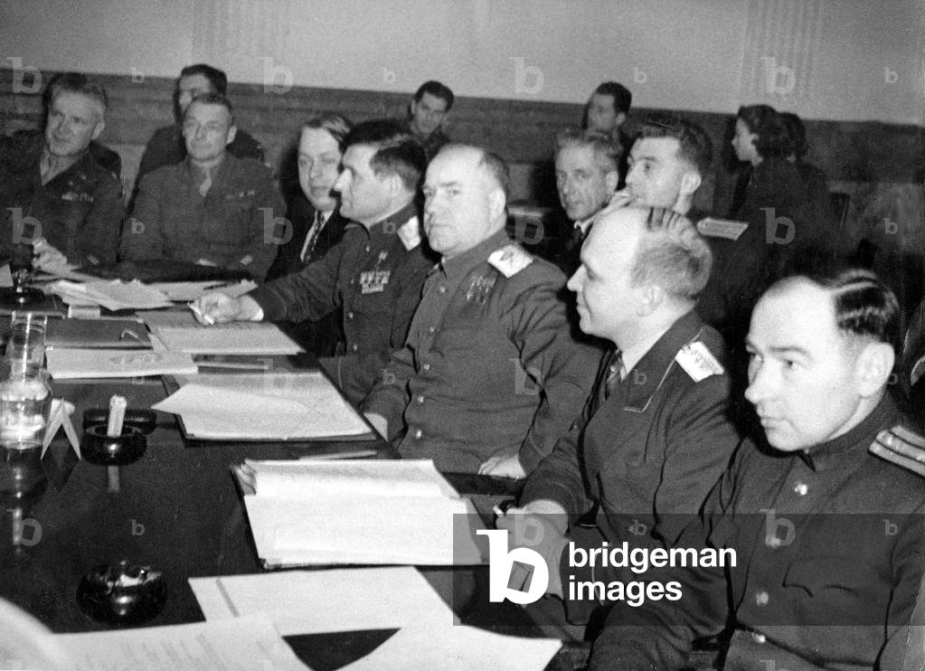 Marshall Zhukov and General Sokolovsky during a meeting of the allies in Berlin on december 14, 1945 : general Joseph McNarney then General Dwight Ike Eisenhower will lead american forces in Europe