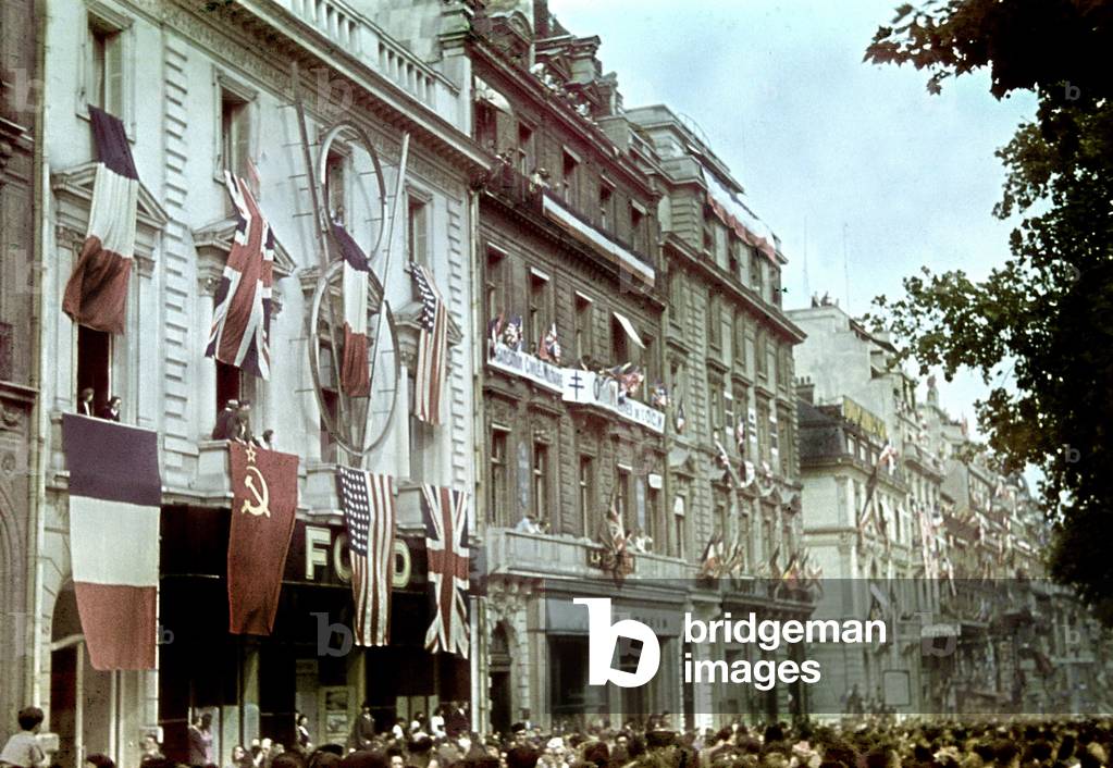 Allied flags (French, english, american and soviet) on the OCM and Ford buildings in Paris after the Liberation, Paris, late august 1944