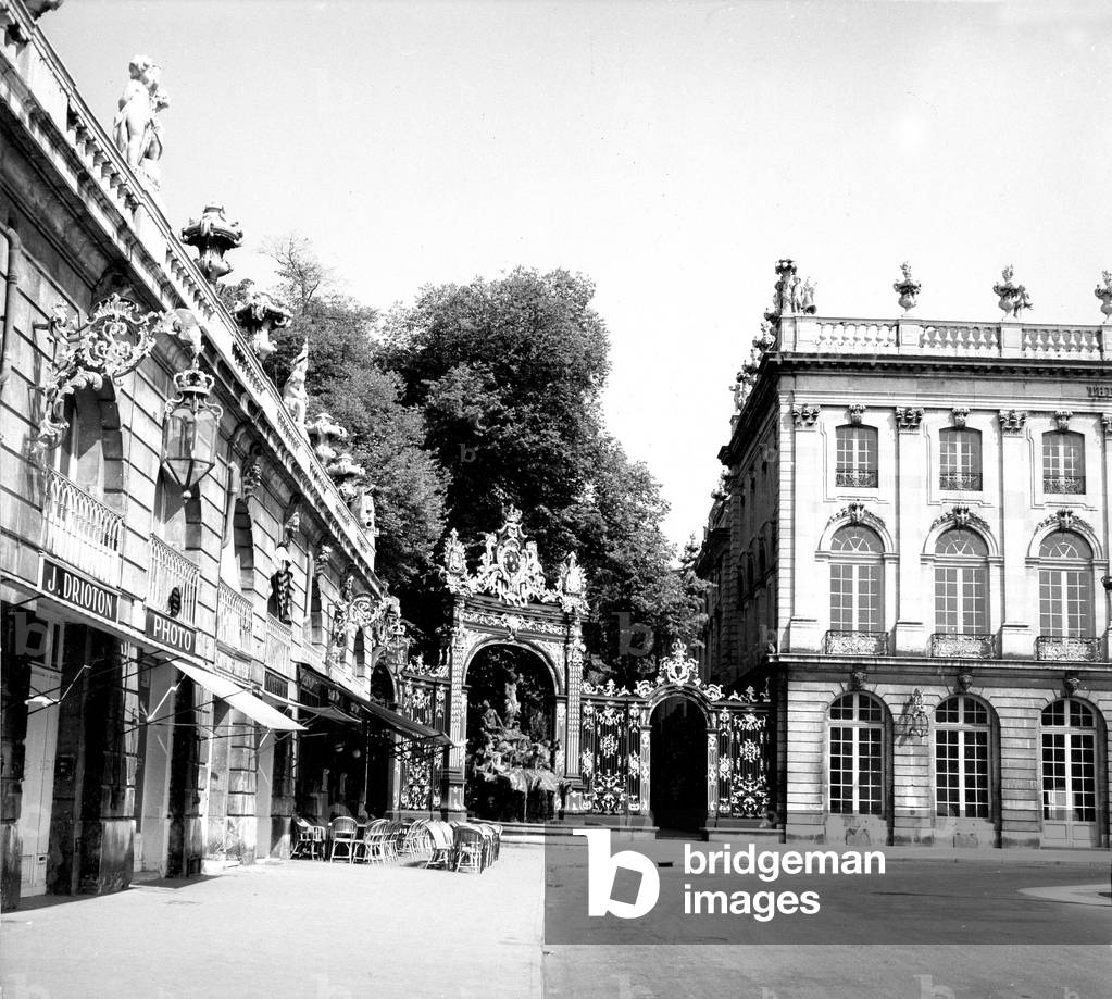 wrought iron gates set off by gold , made by Jean Lamour for Stanislas square in city Nancy, France dating 18th century, here in 1952