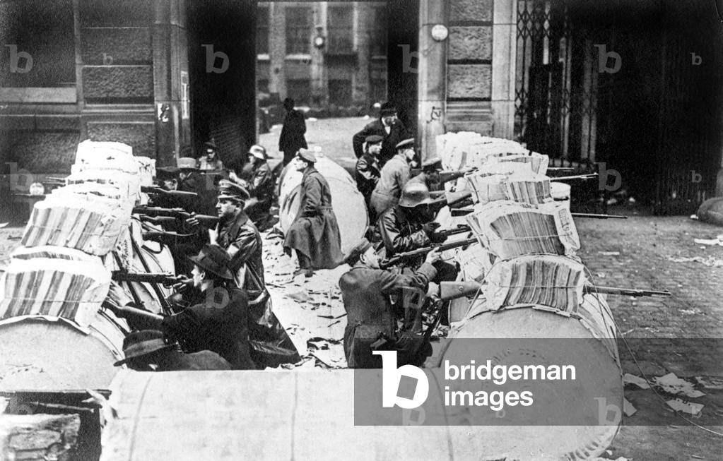 double barricade in Schitzenstrasse, Berlin during the spartakist revolt in Germany november 1918