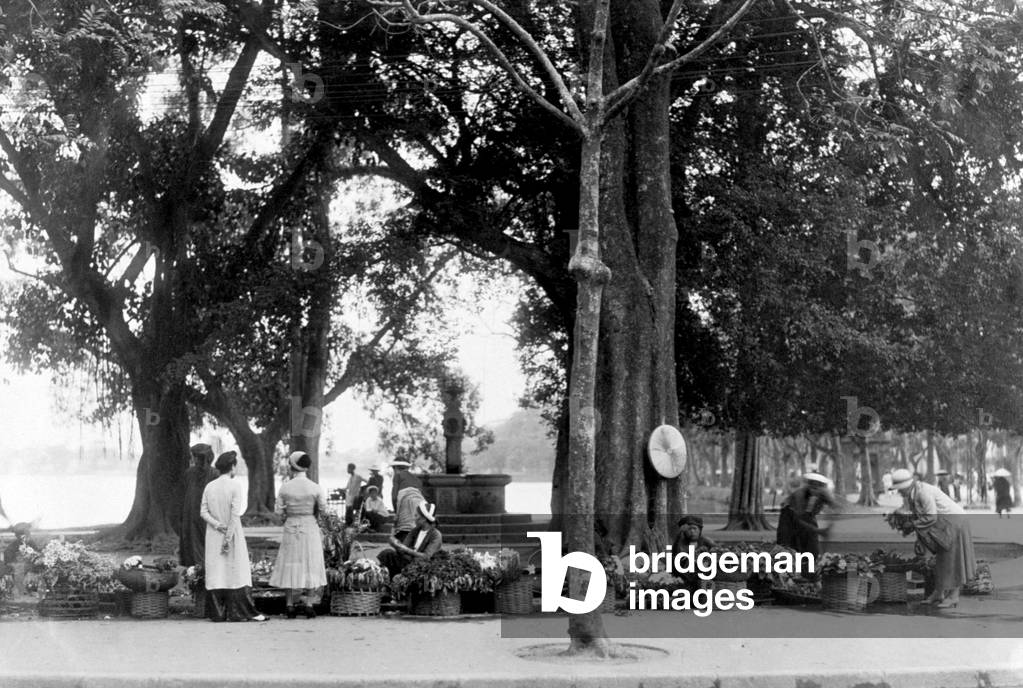 Flowers market along the lake in Hanoi, Indochina, c. 1930