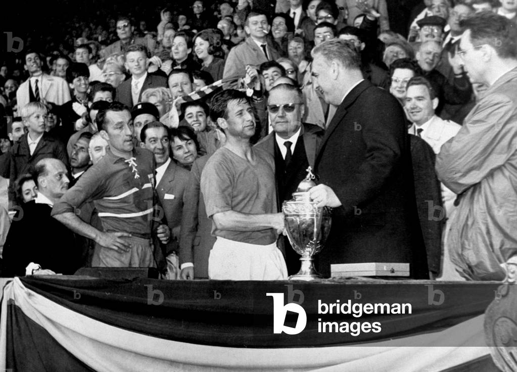 French minister of education Christian Fouchet handing cup to Hidago during the French Cup Final after match Monaco-Lyon in 1963