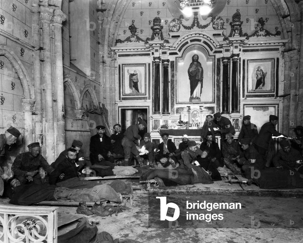 French wounded soldiers have taken refuge in Saint Pierremont church where they are waiting to be treated, 1st world war