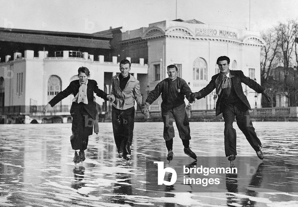 skaters ice-skating on the frozen lake in Enghien, France december 24, 1940