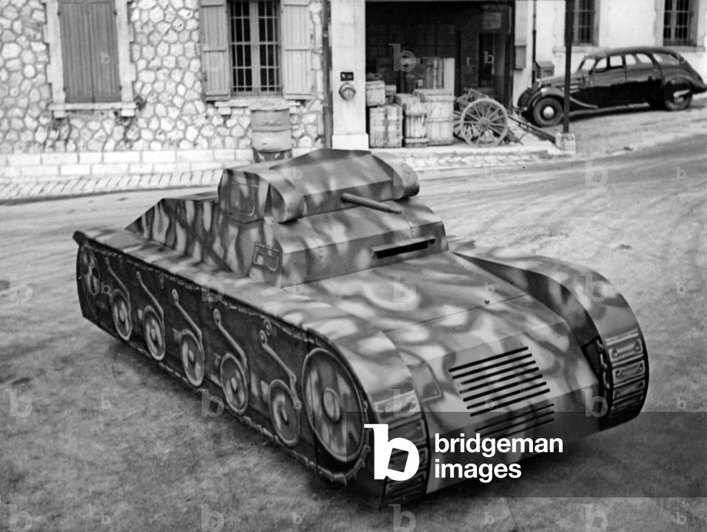 January 1941, Marseille, France : scale model of a tank on a 302 Peugeot car