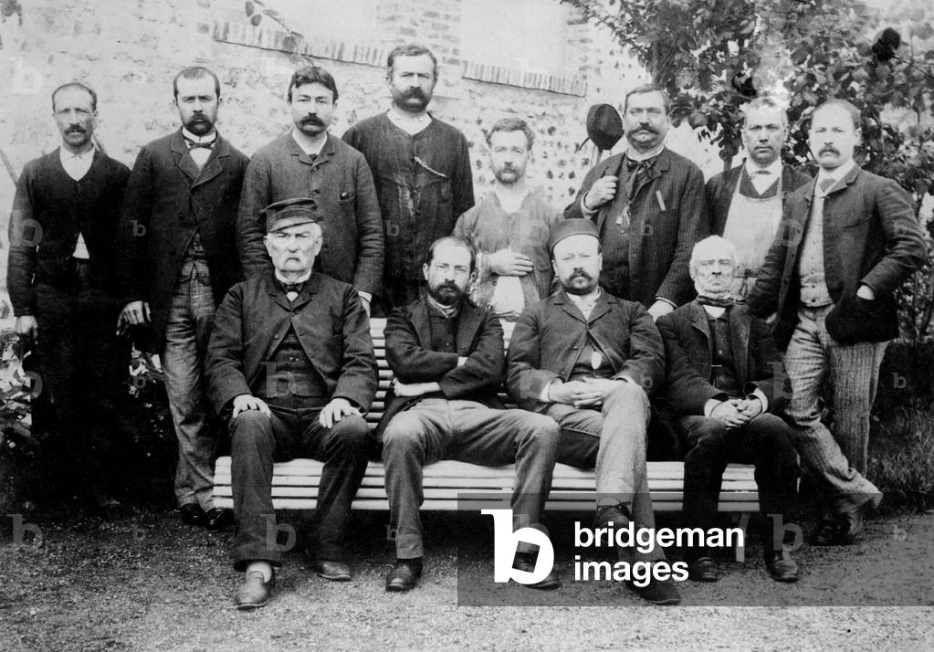 Edouard Michelin (1859-1940), 1st row 2nd from l, posing with workforce of Michelin factory in 1889