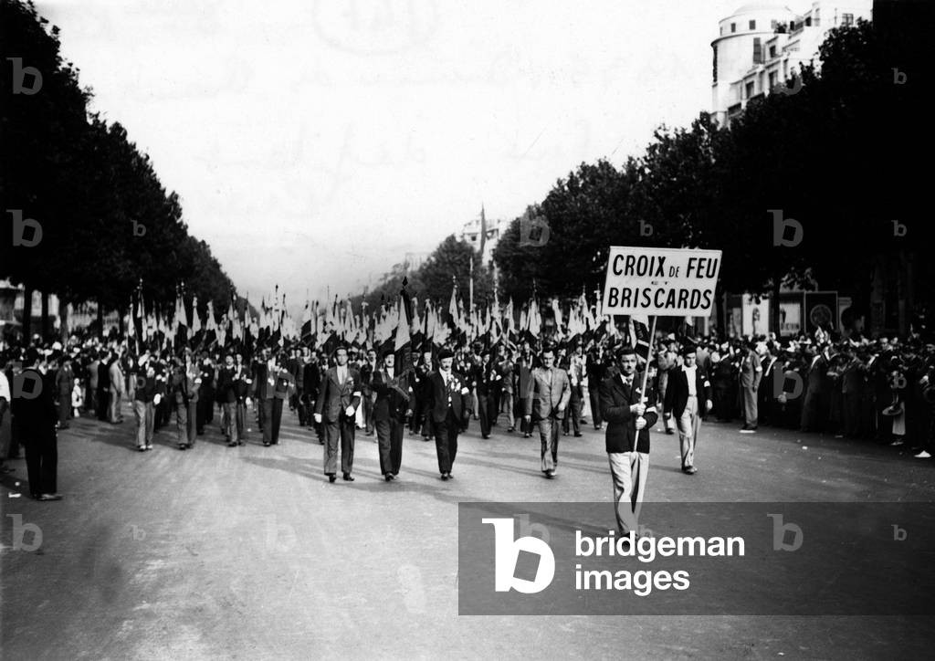 July 14, 1935, Champs Elysees avenue, Paris : parade of the Croix de feu et briscards, organization of veterans created in 1927 to defend the rights of the Poilus