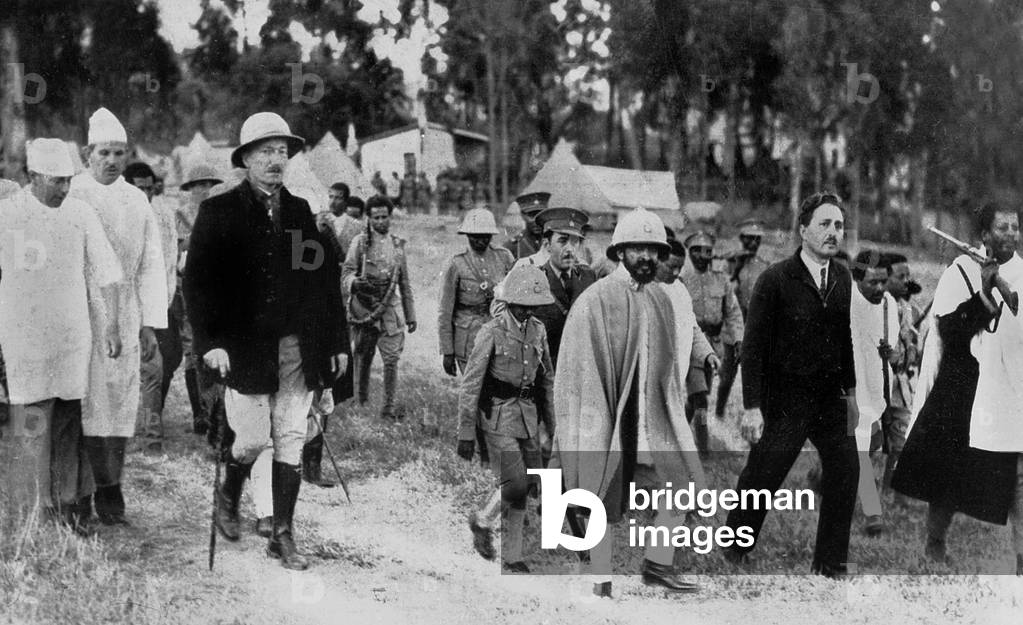 emperor Haile Selassie of Ethiopia, and his son Duke of Harer, visiting Red Cross facilities, on the left are tw american doctors, at the time of the Italian-Ethiopian war december 12, 1935