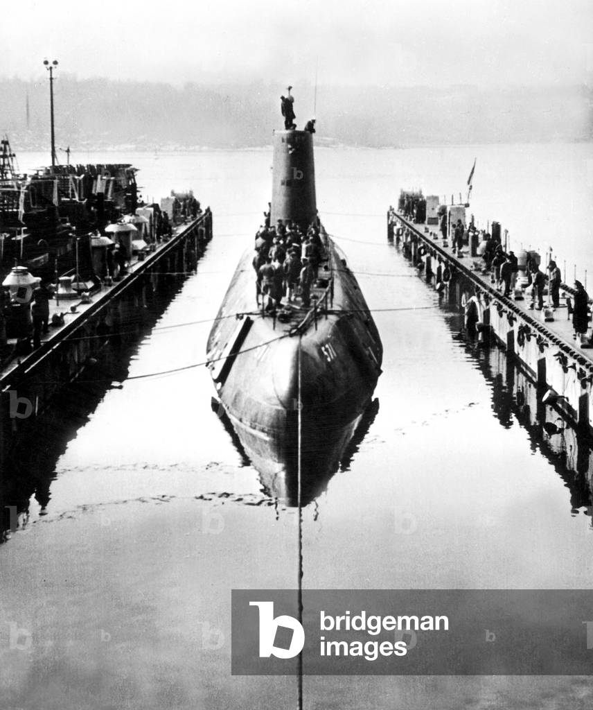 Nautilus american nuclear submarine, here the USS Nautilus returns to its drydock at the submarine base at New London, Connecticut January 25, 1955 after successfully completing her first sea trials