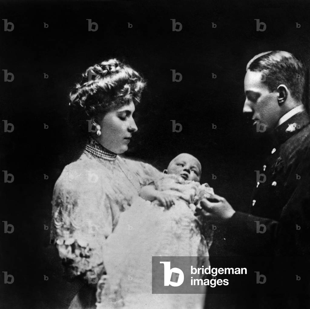King of Spain Don Alfonso XIII and queen Victoria Eugenia with prince baby, Alphonse de Bourbon, in 1907