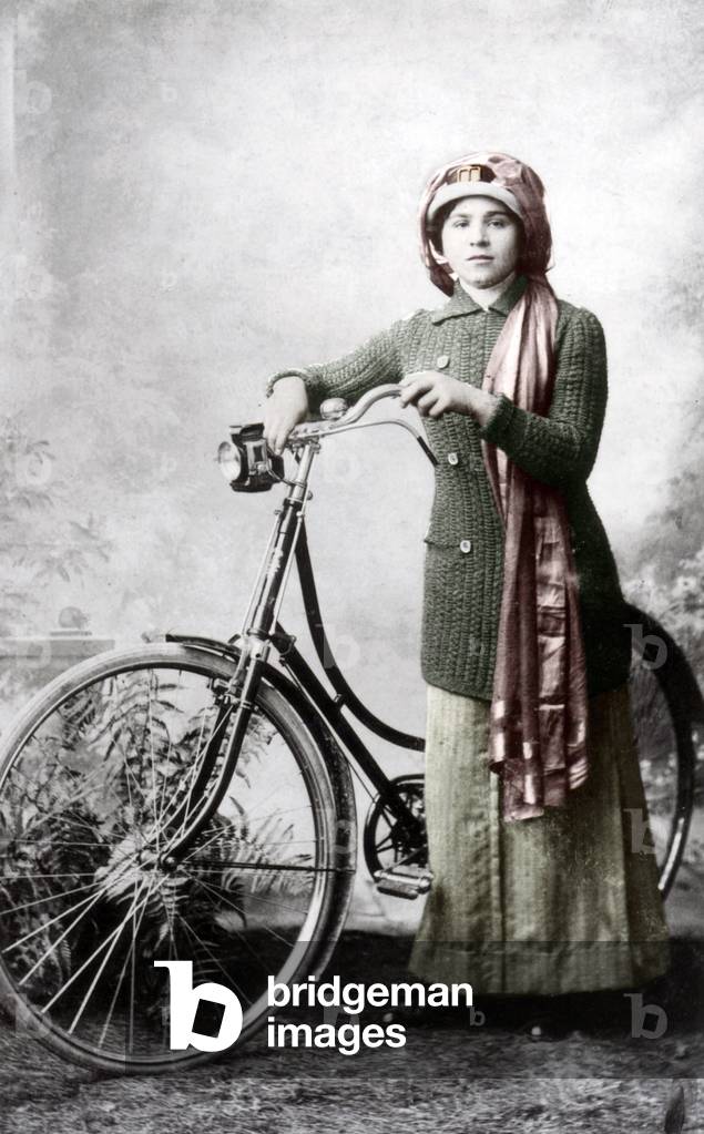 Woman with bike, c. 1910 colourized document
